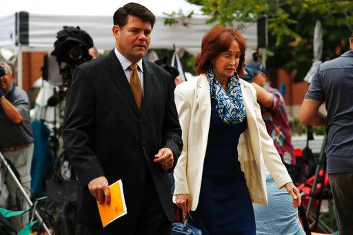 Paul Manafort's wife Kathleen Manafort, right, walks with Manafort spokesman Jason Maloni, to federal court for jury deliberations in the trial of the former Trump campaign chairman, in Alexandria, Va., Tuesday, Aug. 21, 2018. [Photo: AP/Jacquelyn Martin]