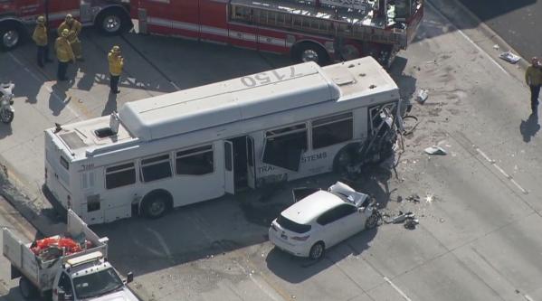 This aerial image made from video provided by KABC-TV shows the wreckage of a bus accident along Interstate 405 in Los Angeles on Sunday, Oct. 14, 2018. Authorities say at least 25 people were injured when the bus crashed into vehicles and through a concrete divider on the highway. [Photo: AP/KABC-TV]