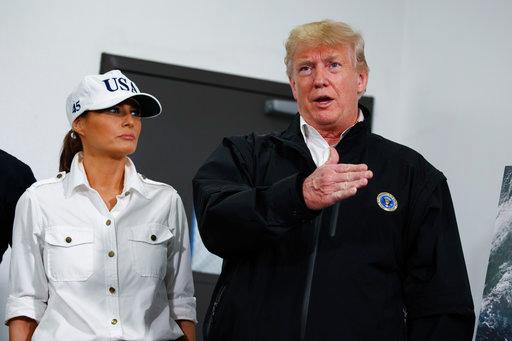 First lady Melania Trump looks on as President Donald Trump speaks during a briefing with state and local officials on the response to Hurricane Michael, Monday, Oct. 15, 2018, Macon, Ga. [Photo: AP/Evan Vucci]